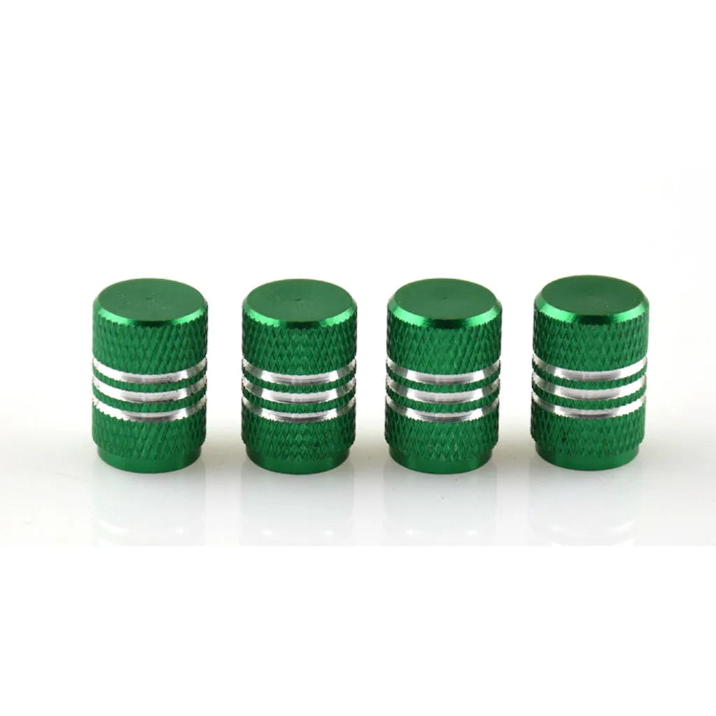 Set of stainless steel car tyre valve caps in multiple colours including red, blue, black, and silver.