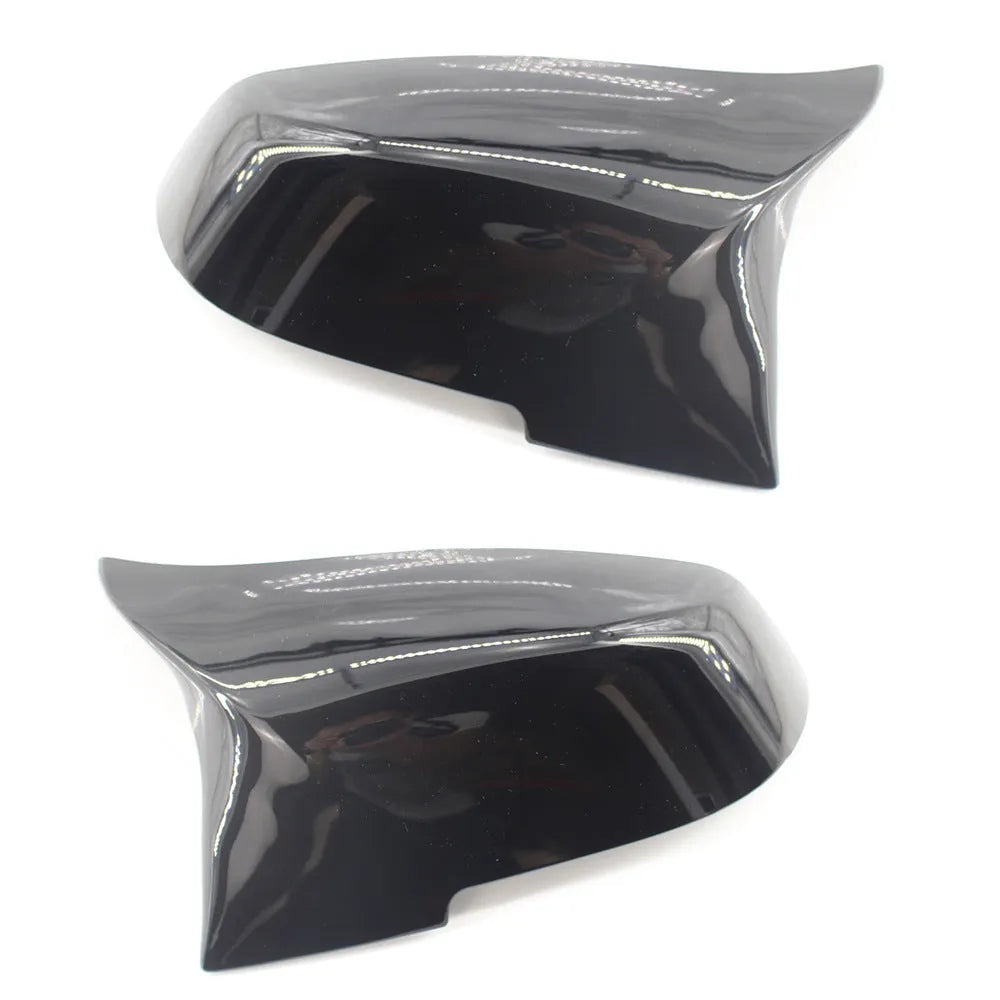 Pair of paint bright black horn-style BMW rearview mirror shells for F30 3 Series.