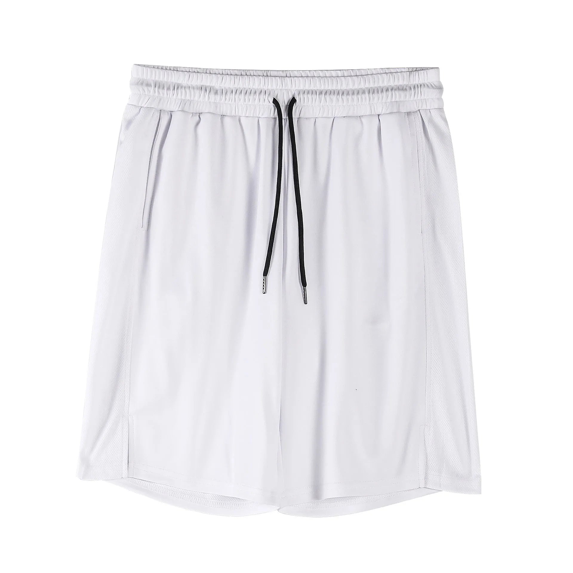 Man wearing black loose-fit mesh capri shorts with an elastic waist for sports.