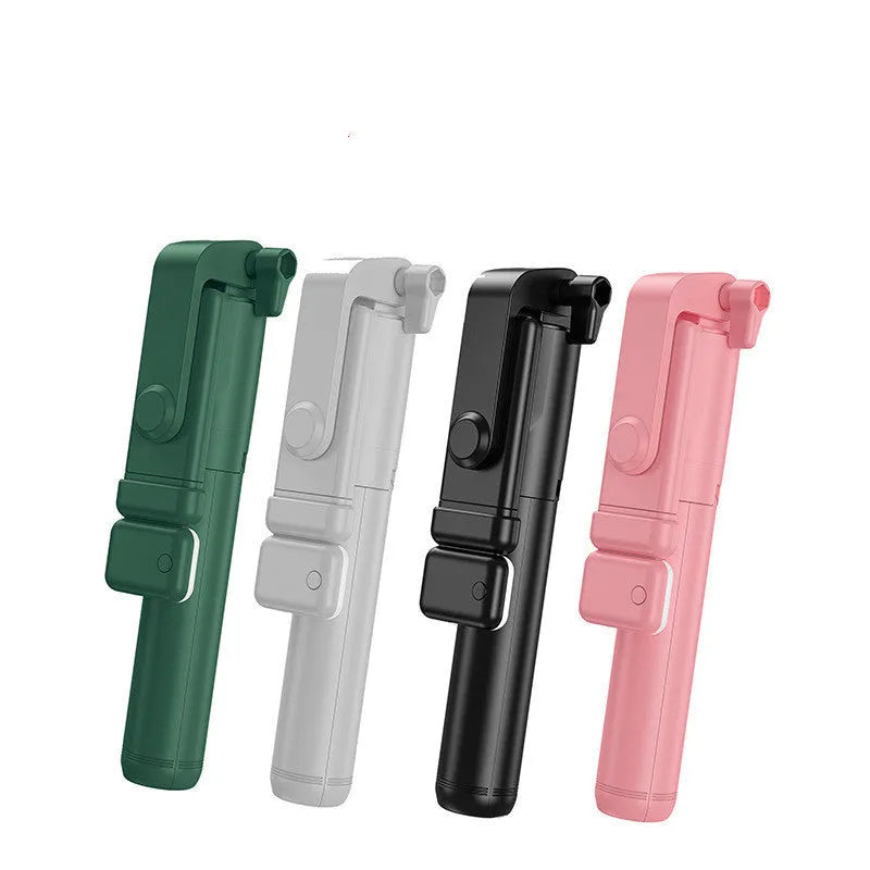 Black Bluetooth selfie stick with integrated tripod and 360-degree rotating phone holder, shown with a remote control.