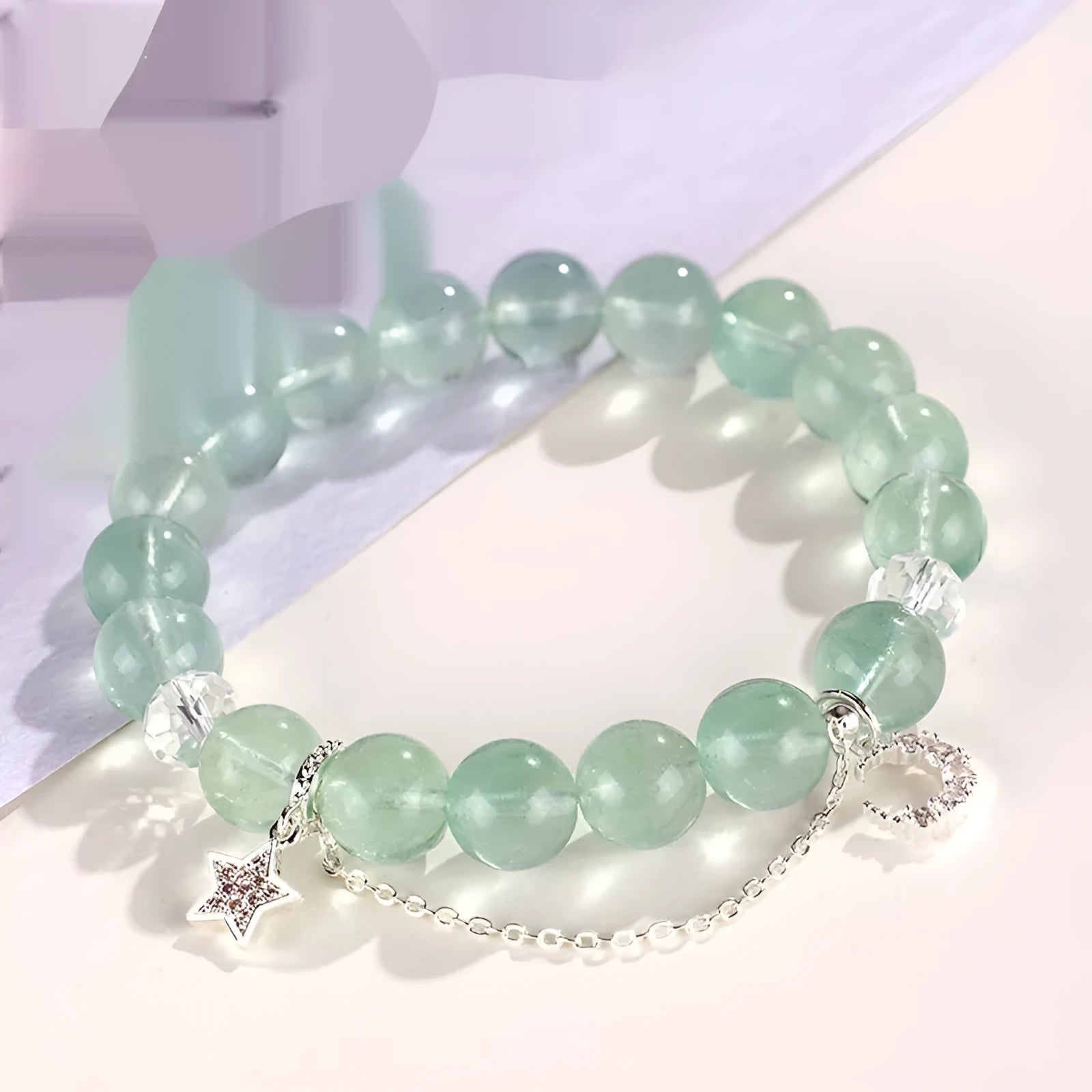Green fluorite star moon princess bracelet with white crystal accents and electroplated finish