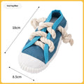 Plastic dog chew toy in slipper shape with sound feature, shown in yellow, black, and blue colour options.
