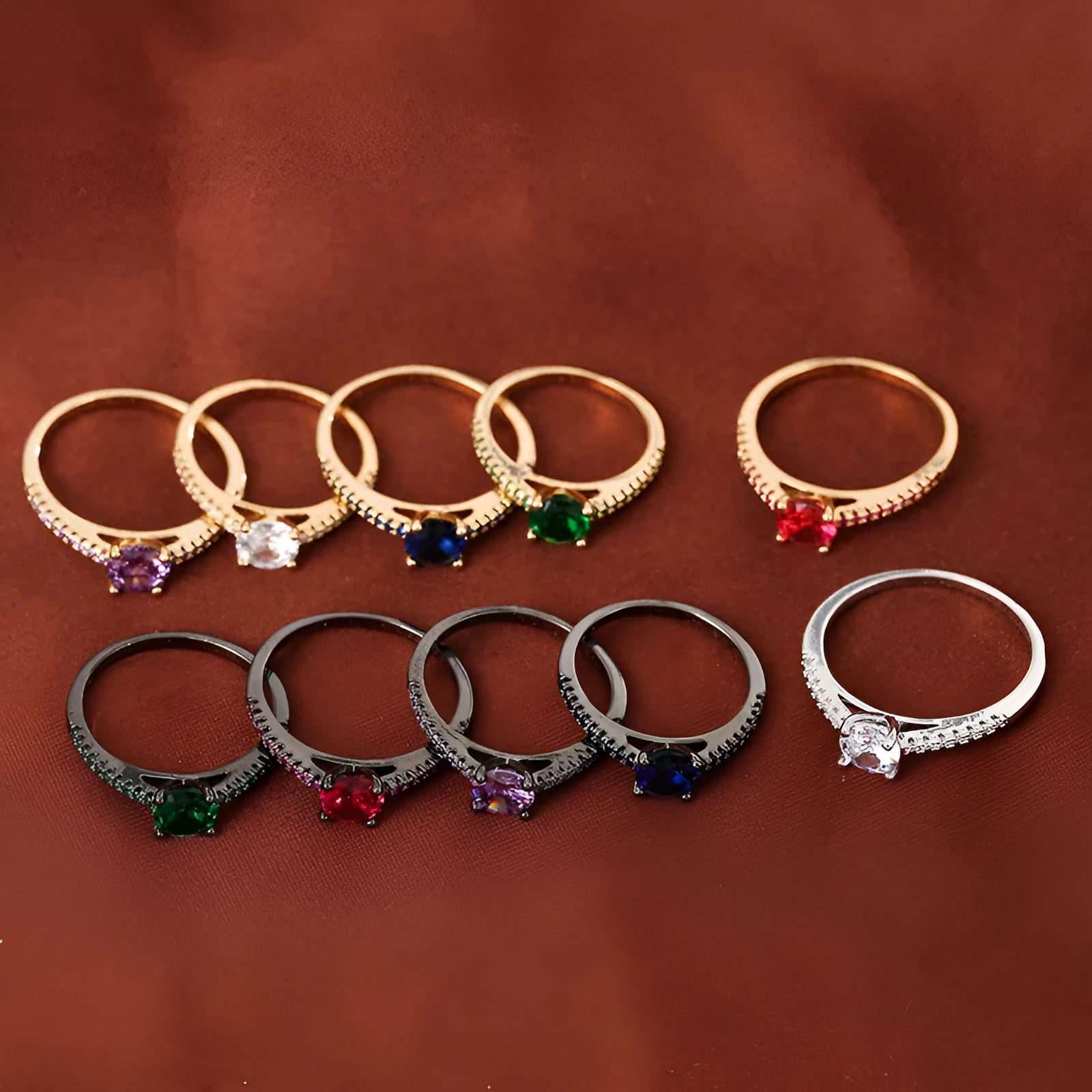 A hexagonal zircon fashion ring made from copper, shown in an electroplated gold rose red finish.