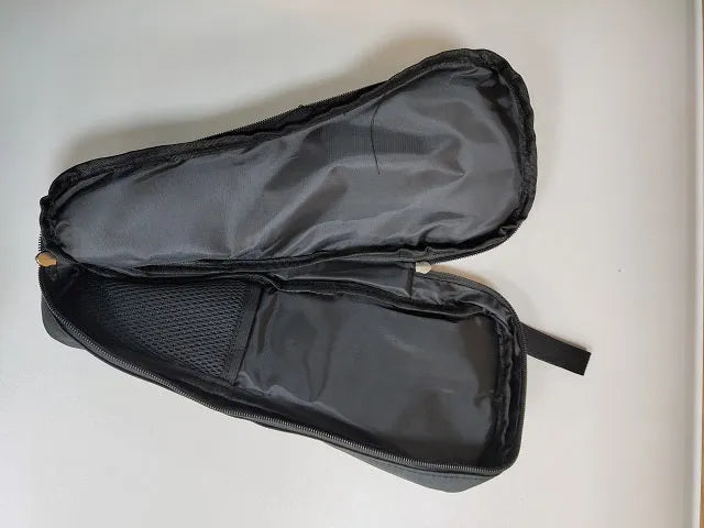 Black cloth storage bag for a mobile phone stabilizer and its accessories.