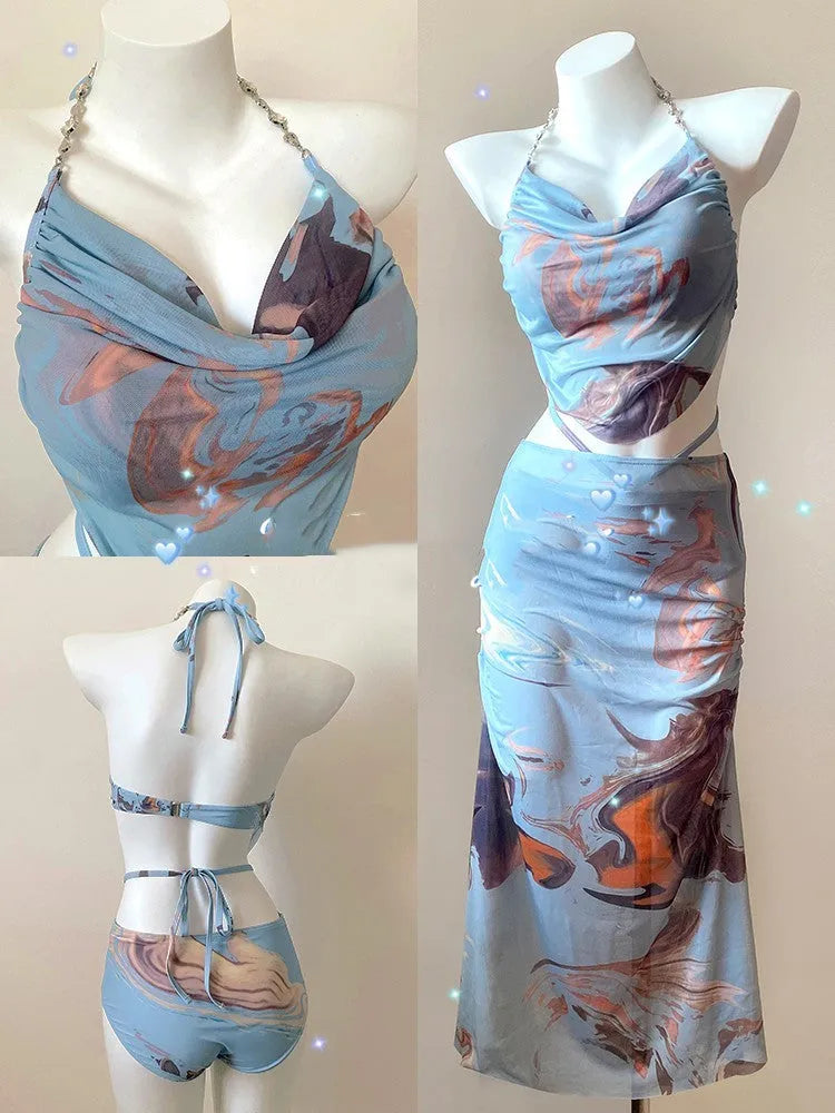 Women's blue printed bikini set with triangle top, high-waisted briefs and skirt showing steel support construction