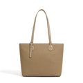 Women's genuine leather tote bag 30cm wide in black colour showing internal zipper compartments and retro styling