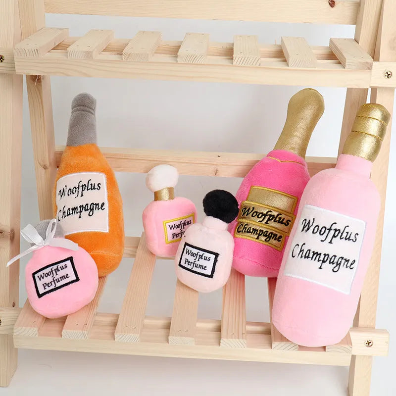 Soft plush pet toy in the shape of a wine bottle, shown in various colours.