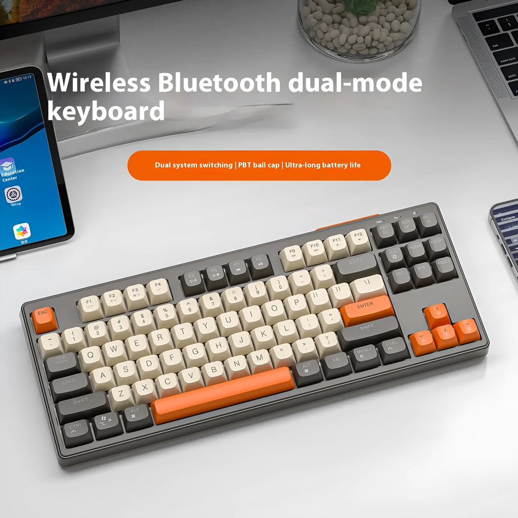 Free Wolf M87 wireless Bluetooth dual mode mechanical feeling keyboard in blueberry colour on desk