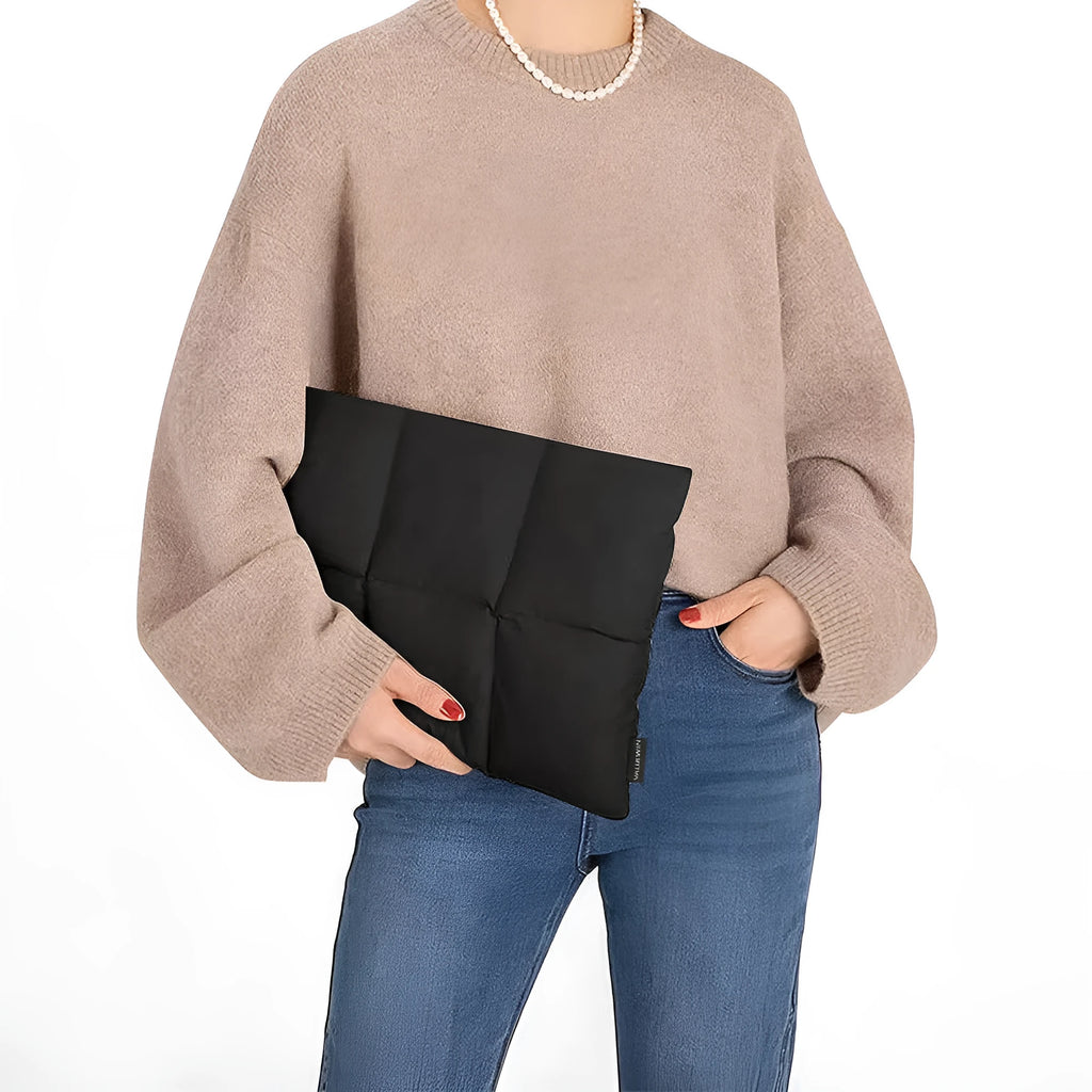 Soft black polyester laptop sleeve for a 15.6-inch laptop with stitching detail.