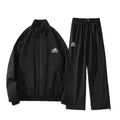 Outdoor waterproof ski suit set with jacket and trousers in cotton blend fabric for winter sports