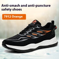 Leather upper anti-smashing safety shoe with rubber sole in orange colour on a work site background.