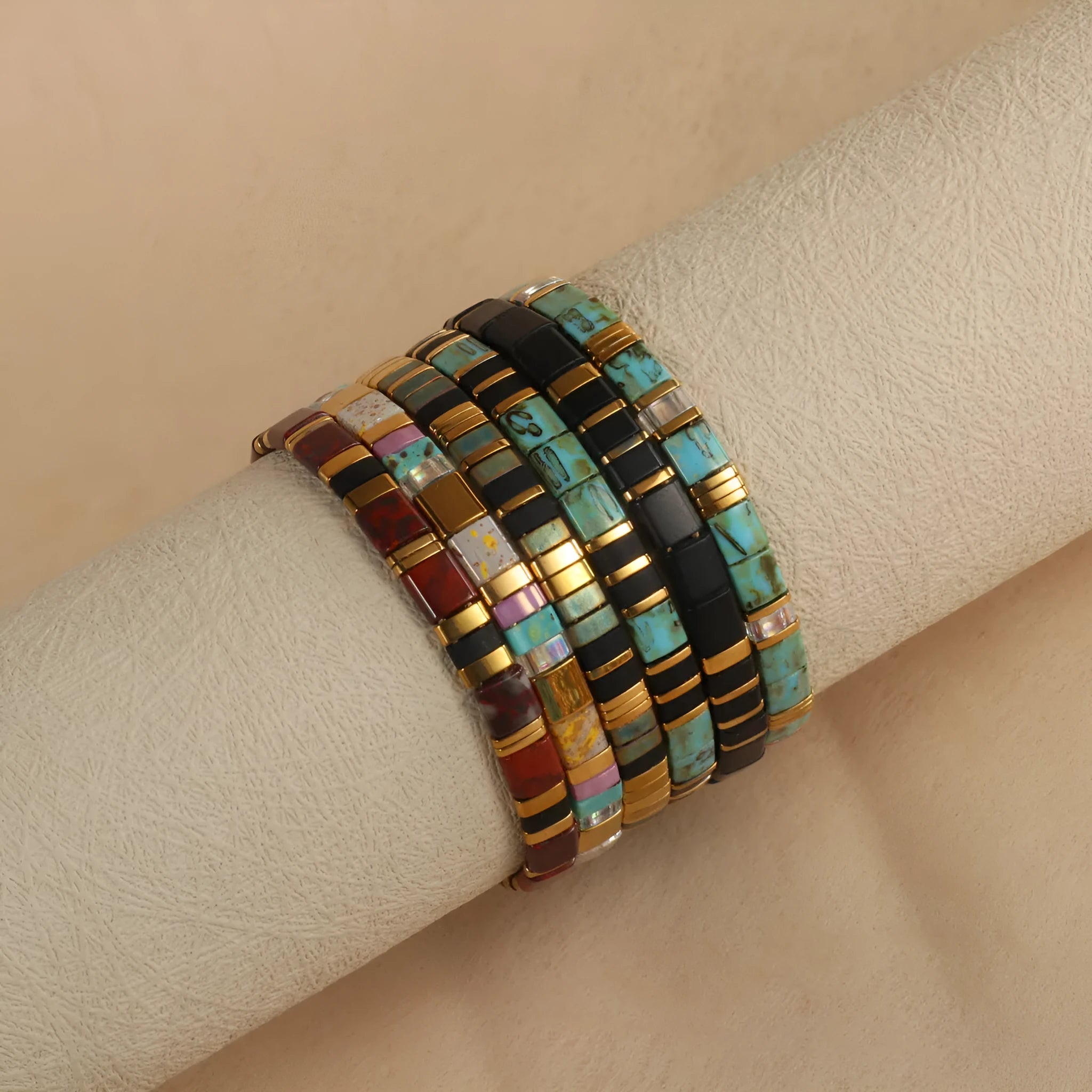 Geometric pull bead bracelet with round glass beads in five colour options