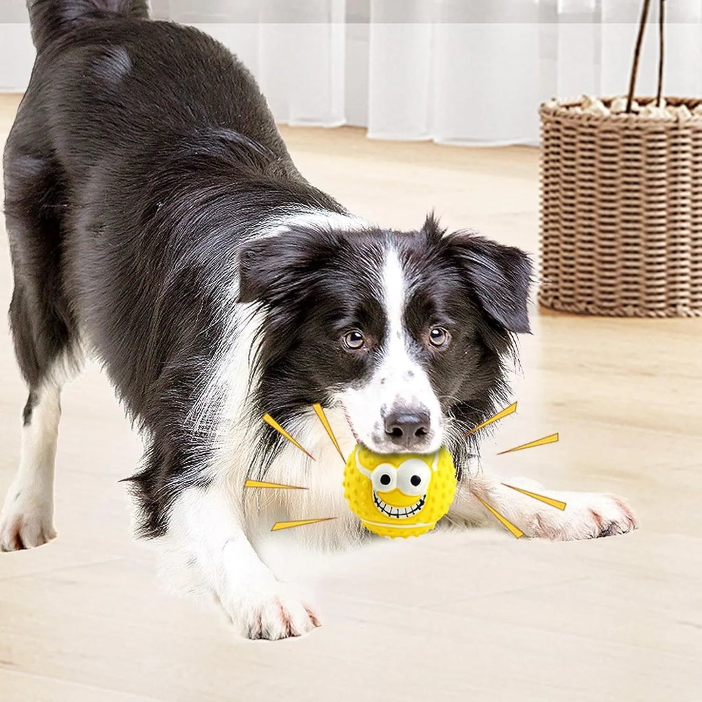 Green, orange, and yellow smile face latex squeaky dog ball toy.