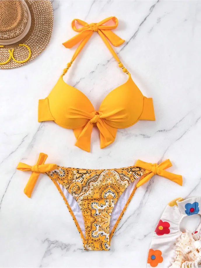 Ladies polyester bikini swimsuit two-piece set showing colour options and sizing information