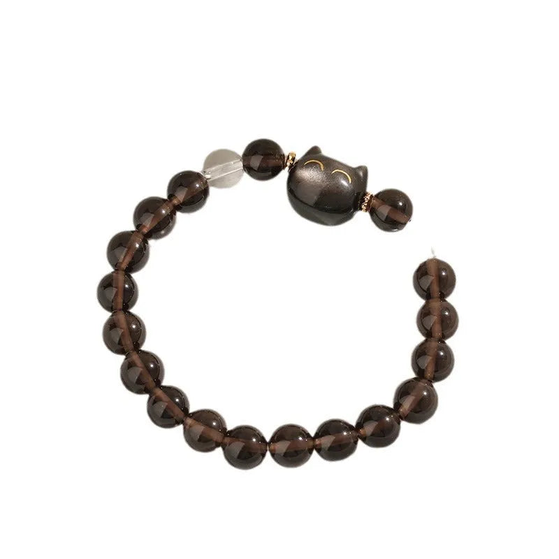 Women's cat head charm bracelet with 8mm Ice Stone on natural silver stone setting.