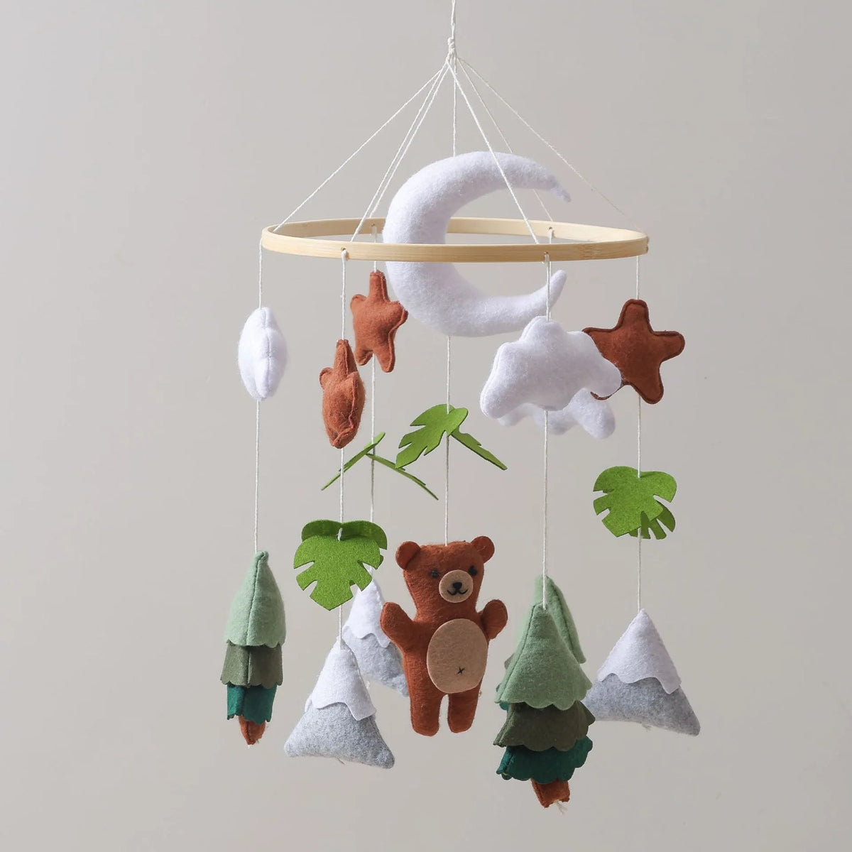 Handmade felt teddy bear bed bell for children in white, made from wood and felt, supplied in a leather paper box