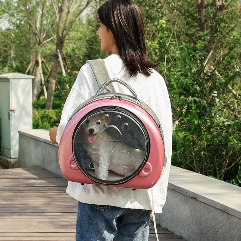 Transparent capsule-style cat carrier bag in PC canvas with solid colour finish.