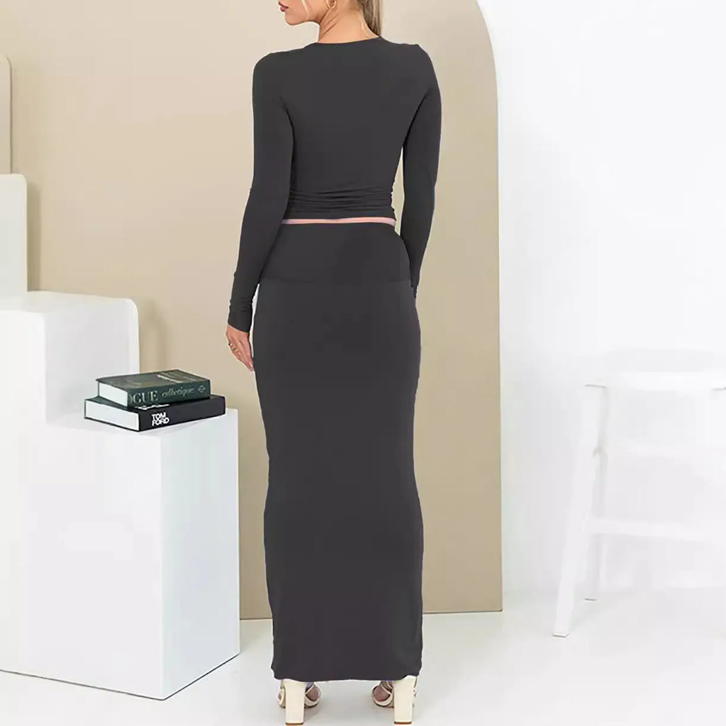 Women's pure colour slim fit two-piece suit with long skirt and three-quarter sleeve top for autumn.