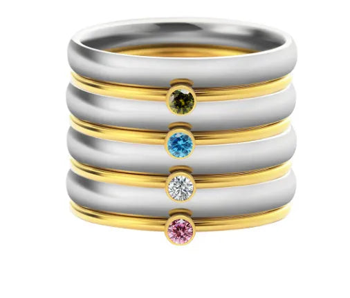 Titanium steel engraved ring with a December colour birthstone and geometric design.