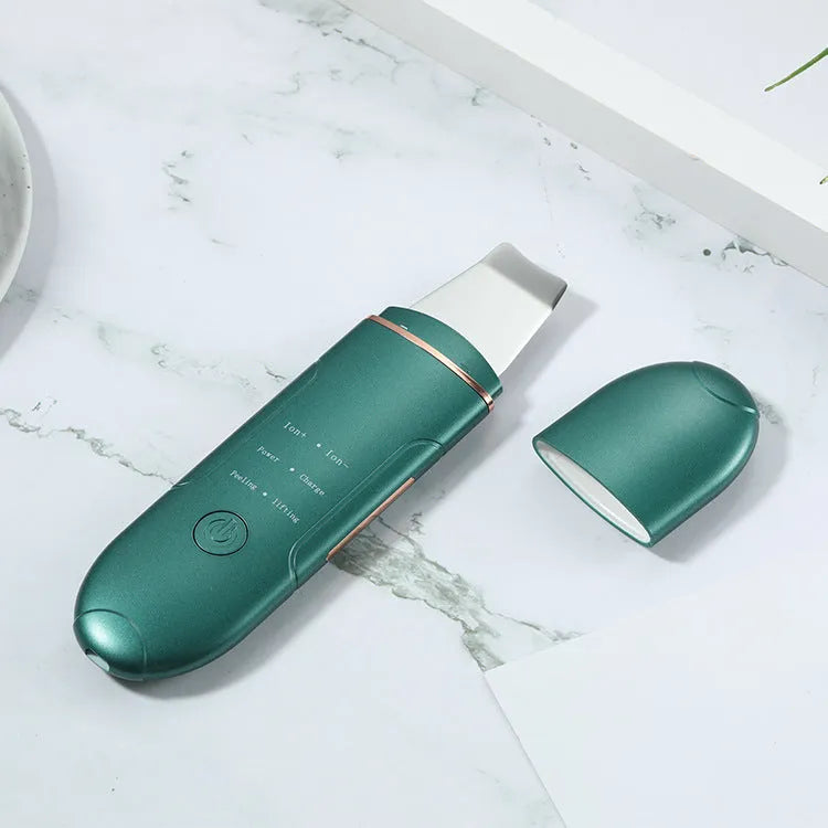Ultrasonic skin rejuvenation whitening shoveling machine in ivory white with handheld design and shovel knife.