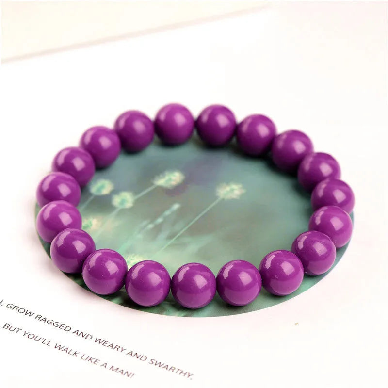 Jiuya polished purple mica crystal bracelet showing single circle design on a wrist.