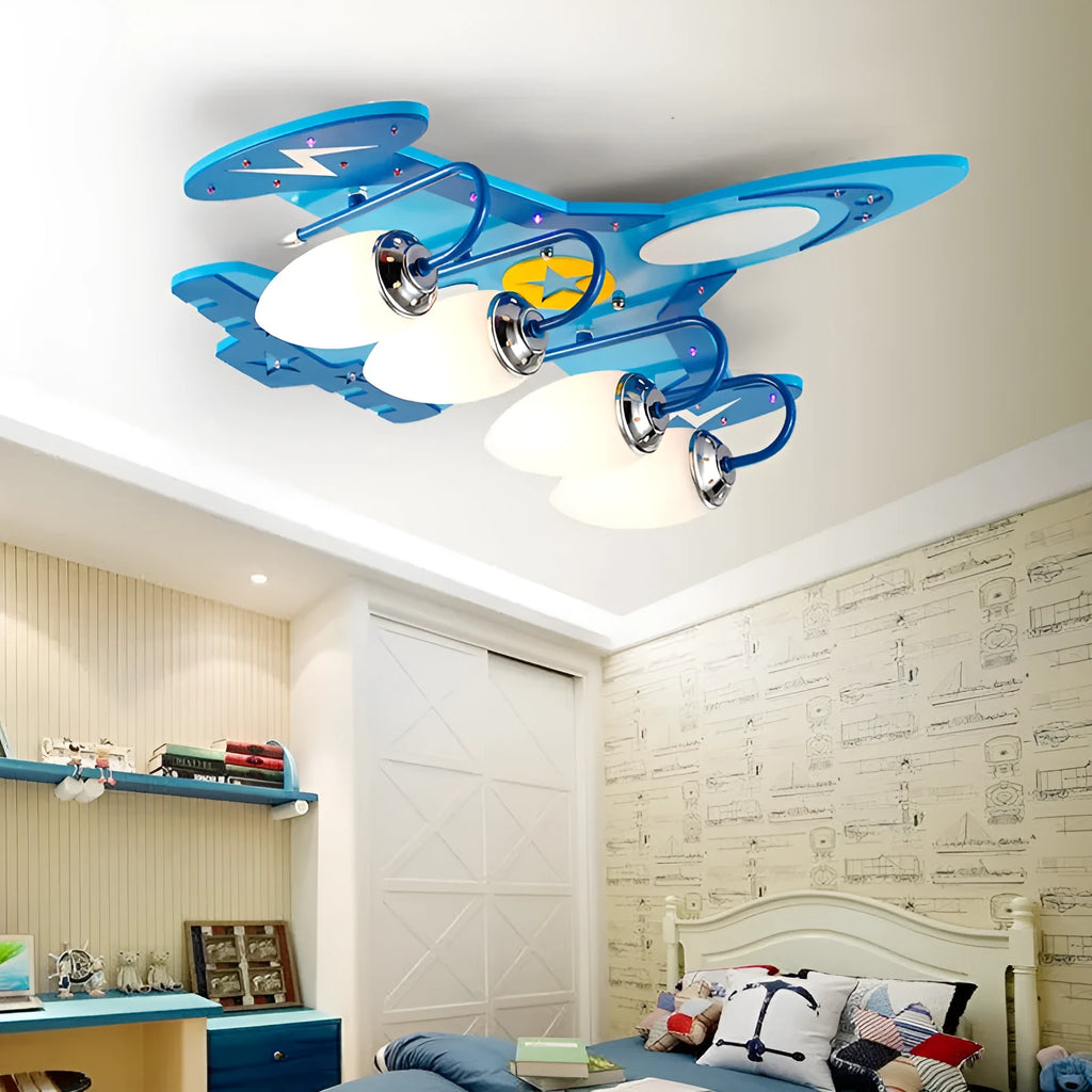 Children's cartoon airplane design LED ceiling light with glass shade and wood fitting.