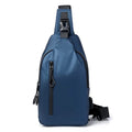 Black sling crossbody chest bag for men with zipper closure and stitched detail on a white background