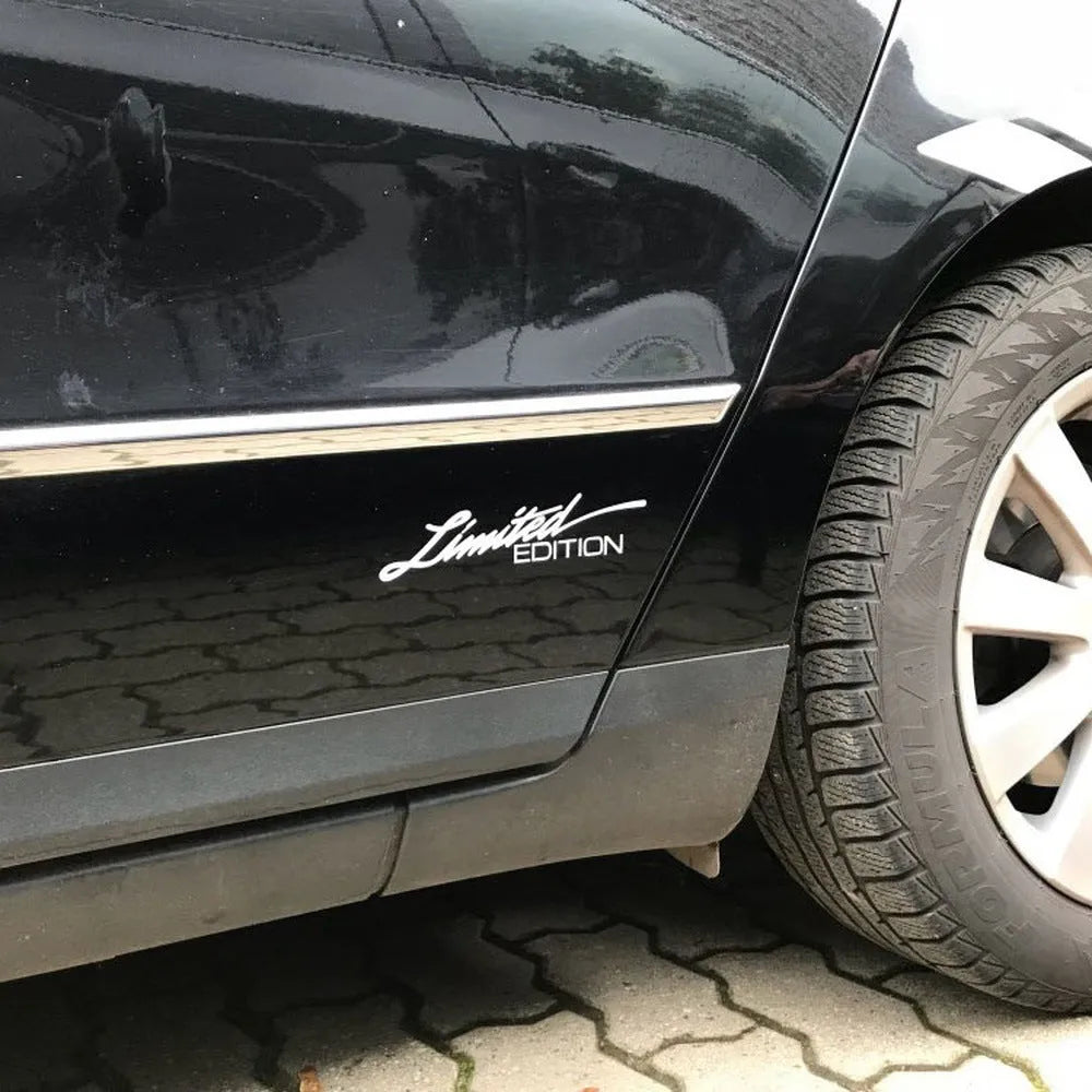 Reflective plastic bumper sticker showing colour options: black, white, and multi-colour, next to a ruler showing 16cm length.