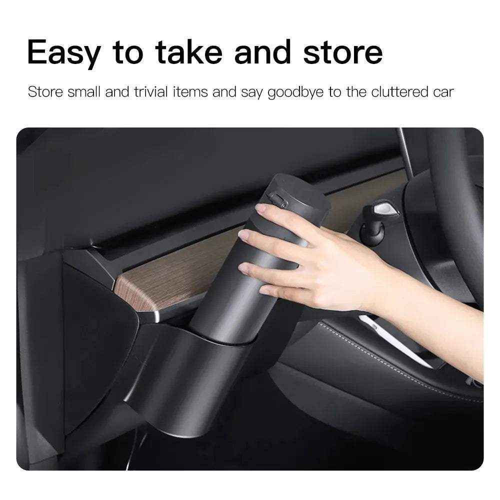 Plastic water cup holder for Tesla Model 3 and Model Y dashboard with a carrying handle.