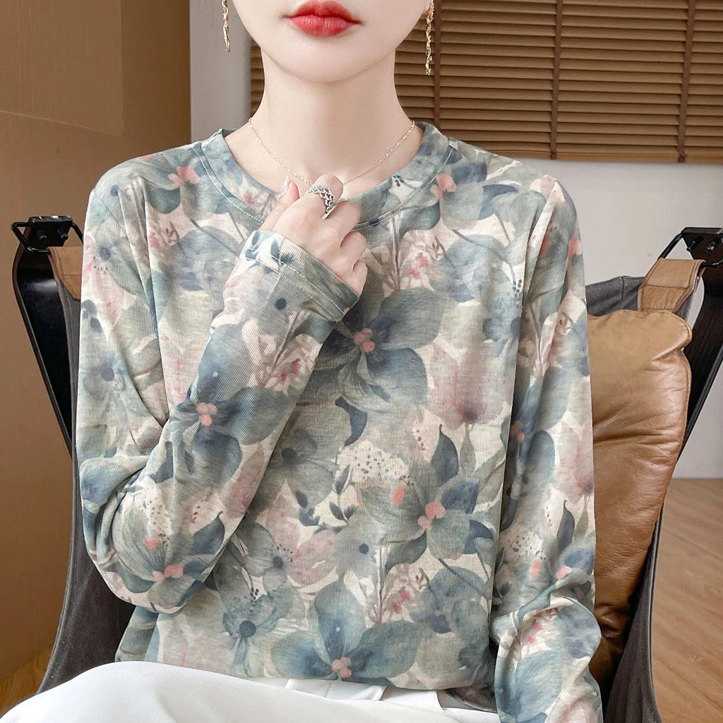 Women's round neck pullover top in a floral print Tencel cotton knitted fabric.