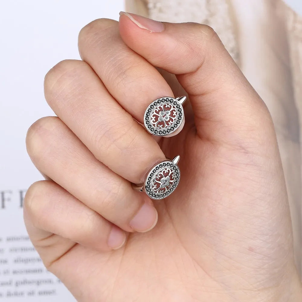 Diamond-encrusted round small ear clip earrings for women copper plated platinum finish geometric shape