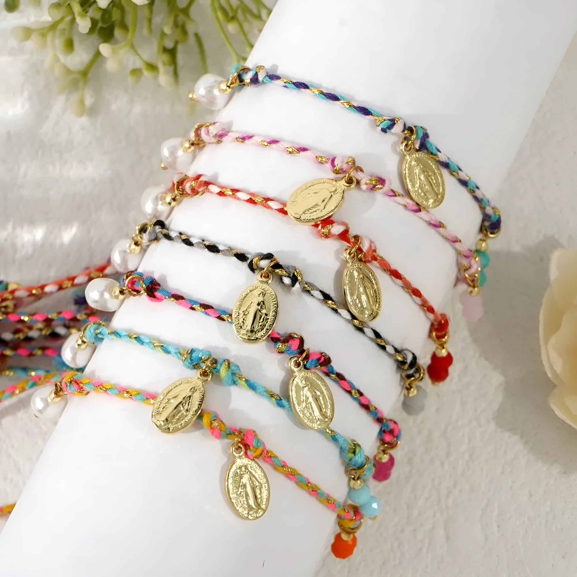 A colourful hand-woven braided rope bracelet in an ethnic strap style for women.