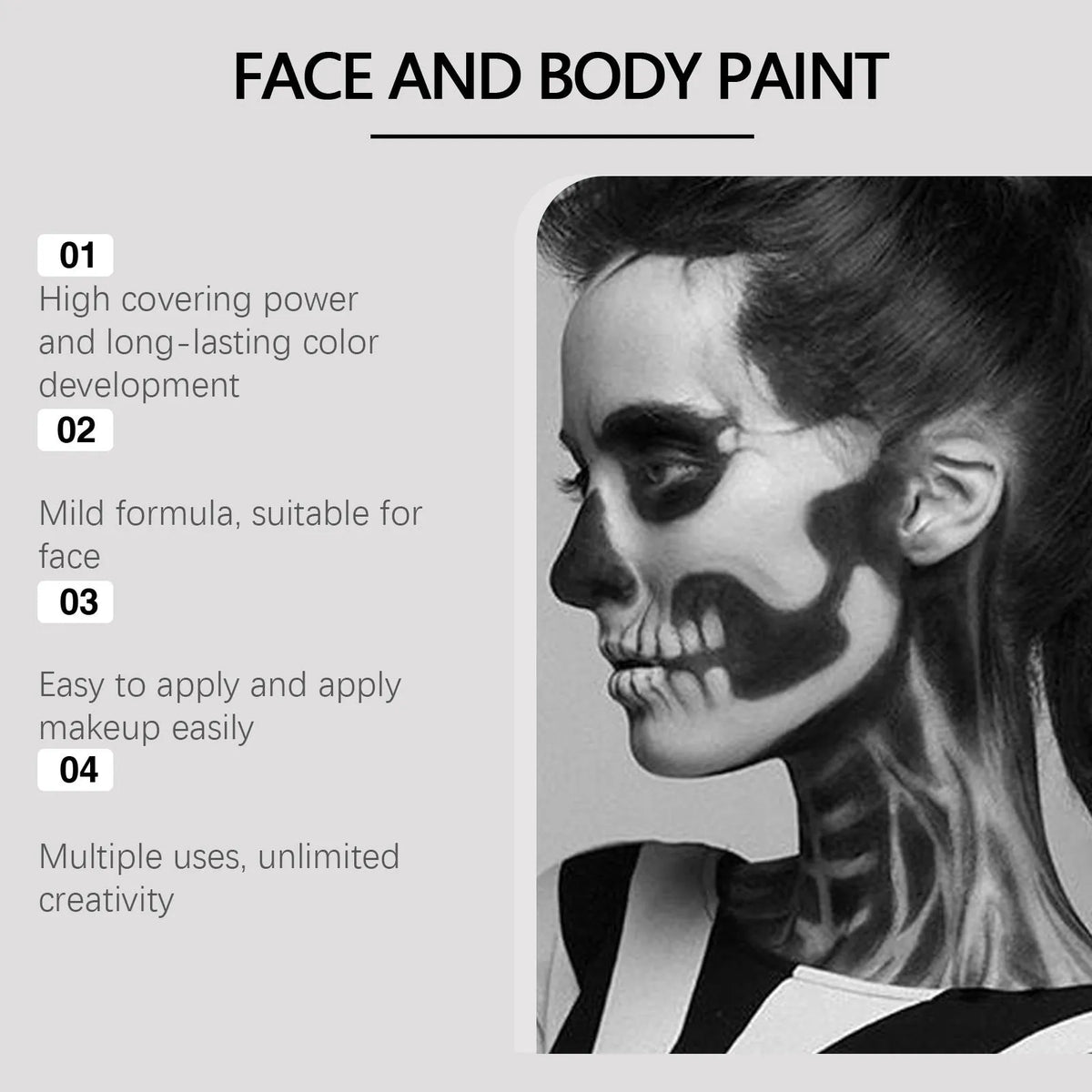 Halloween palette suit with red black white cream foundation palettes, three brushes, and a sponge on a dark background