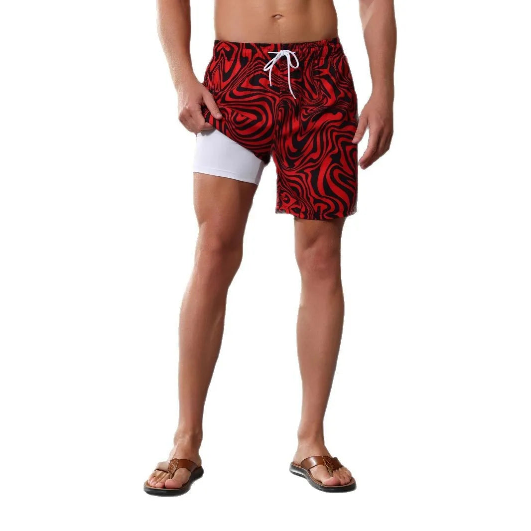 Men's quick-drying beach shorts with elasticated waist and liner in leaf pattern design