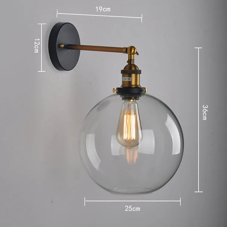 20cm round glass ball wall lamp with aluminium holder in amber, smoke grey, or transparent.