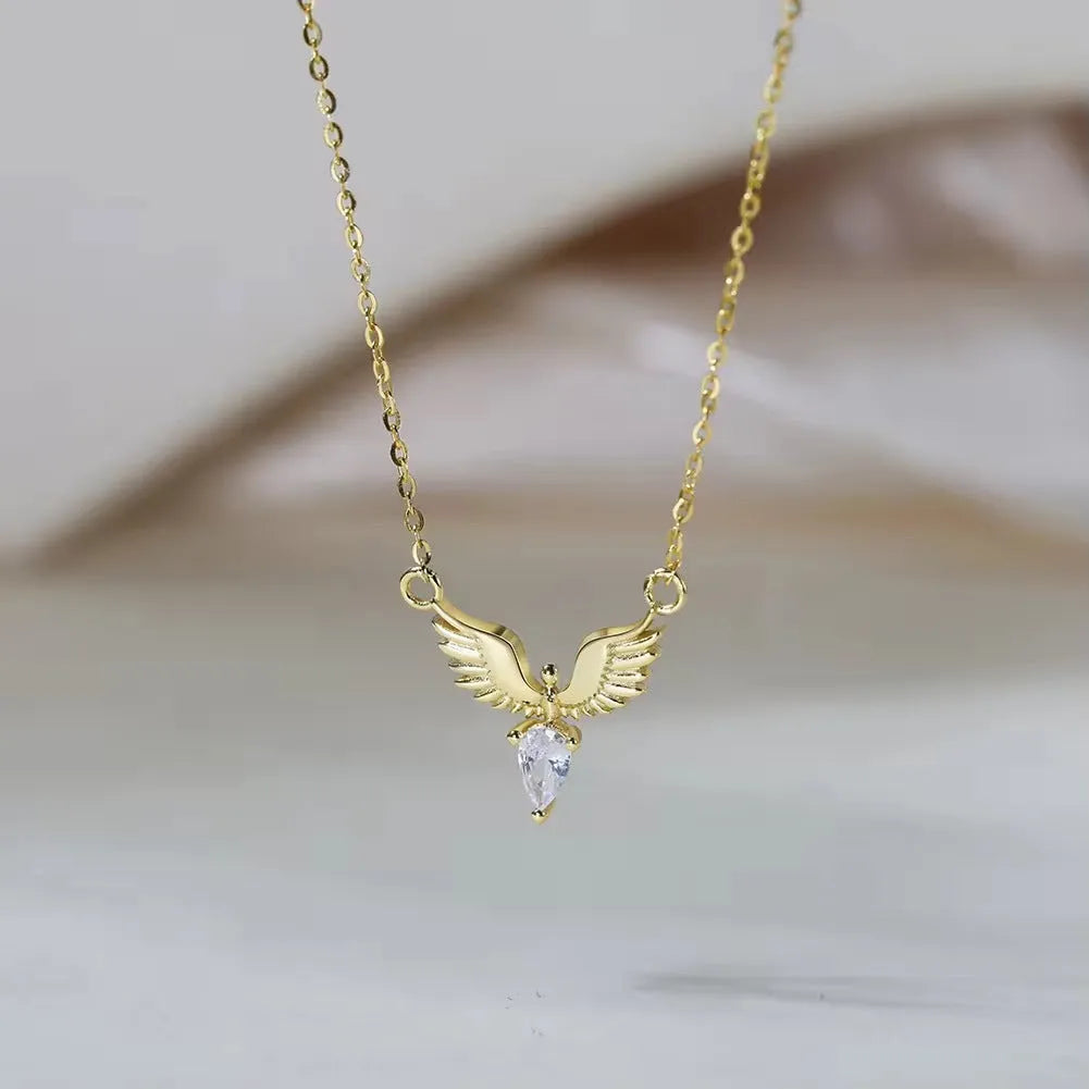 Close-up of an adjustable silver eagle pendant necklace on a textured background, showing the O-ring chain.