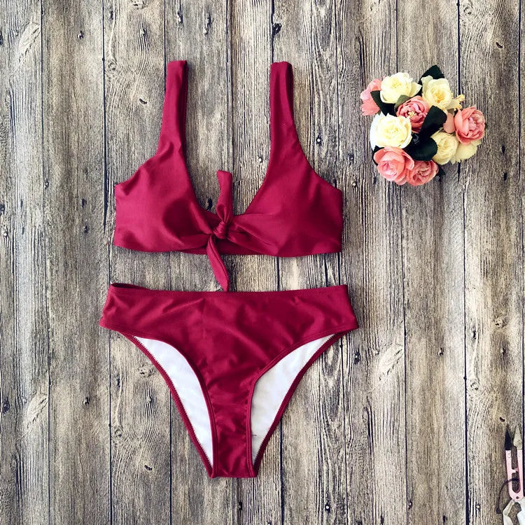 Women's polyester bikini swimwear set in black, pink, red, white, or wine red with bra and briefs
