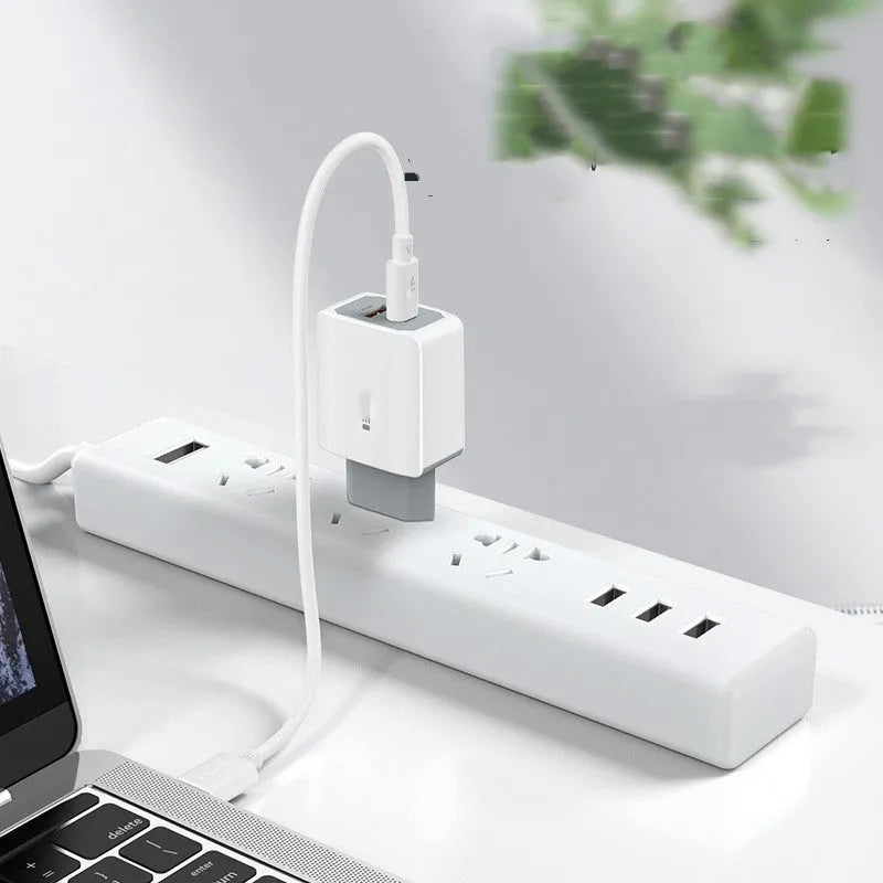 White European standard phone fast charger set with USB cable on a white background