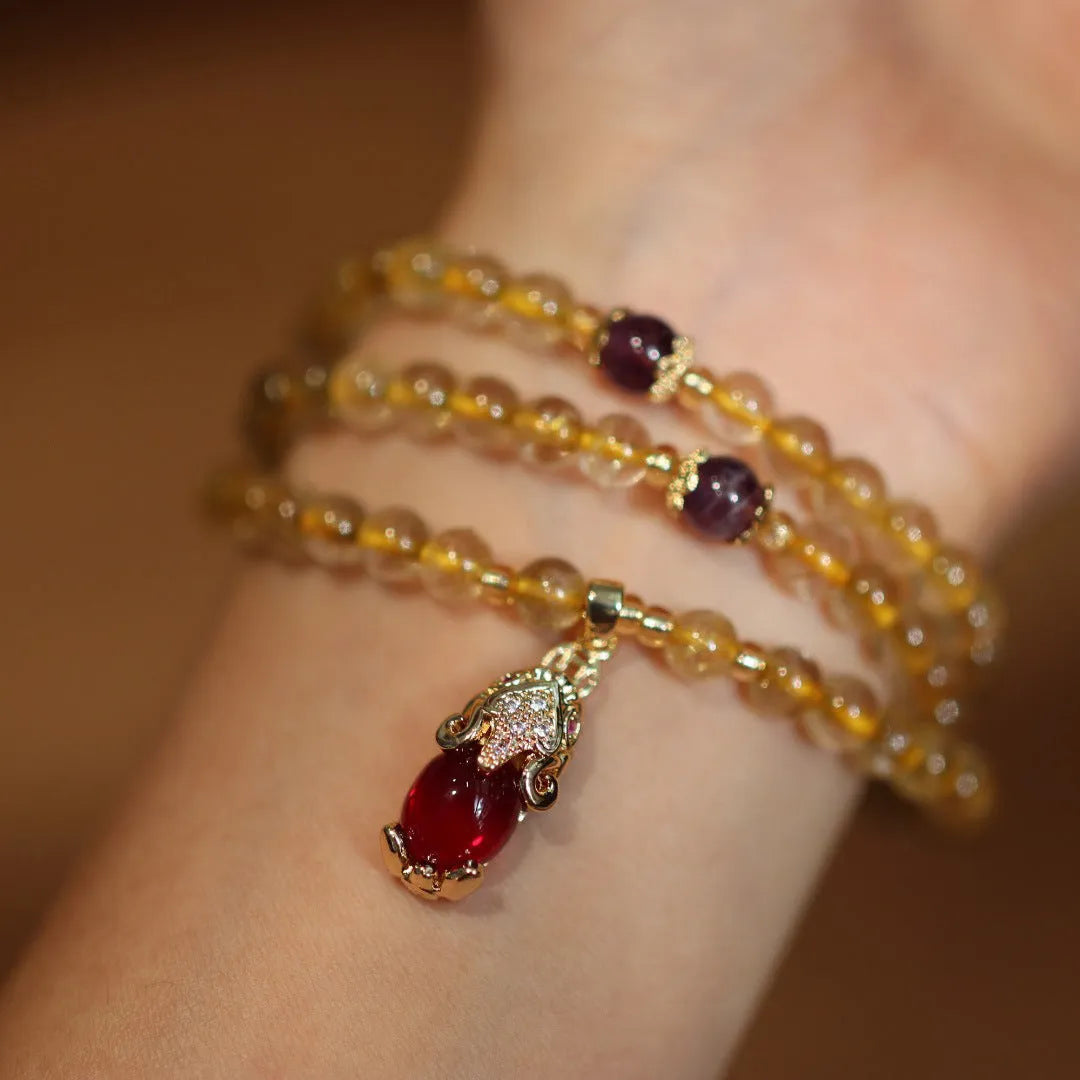 Natural Brazilian gold rutilated quartz bracelet with Chinese style design and hanging chopsticks