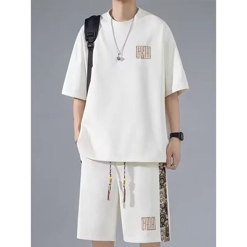 Waffle embroidery two-piece set with short sleeve top and shorts in thin polyester, sports style, black white green apricot