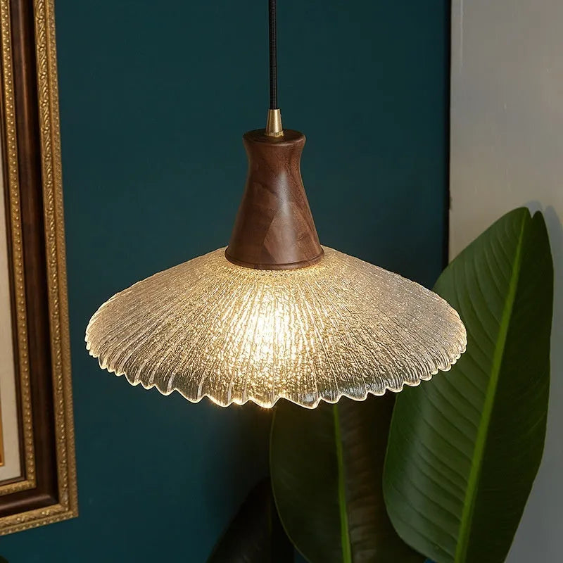 Retro wooden chandelier with glass shade and brass fittings for ceiling lighting.
