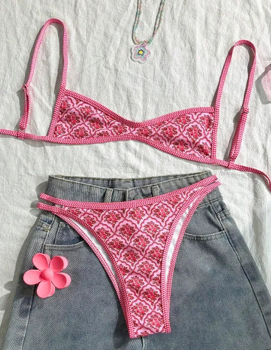 Pink printed two-piece swimsuit with shoulder straps and exposed back, top and shorts set, sizes S M L XL
