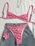 Pink printed two-piece swimsuit with shoulder straps and exposed back, top and shorts set, sizes S M L XL
