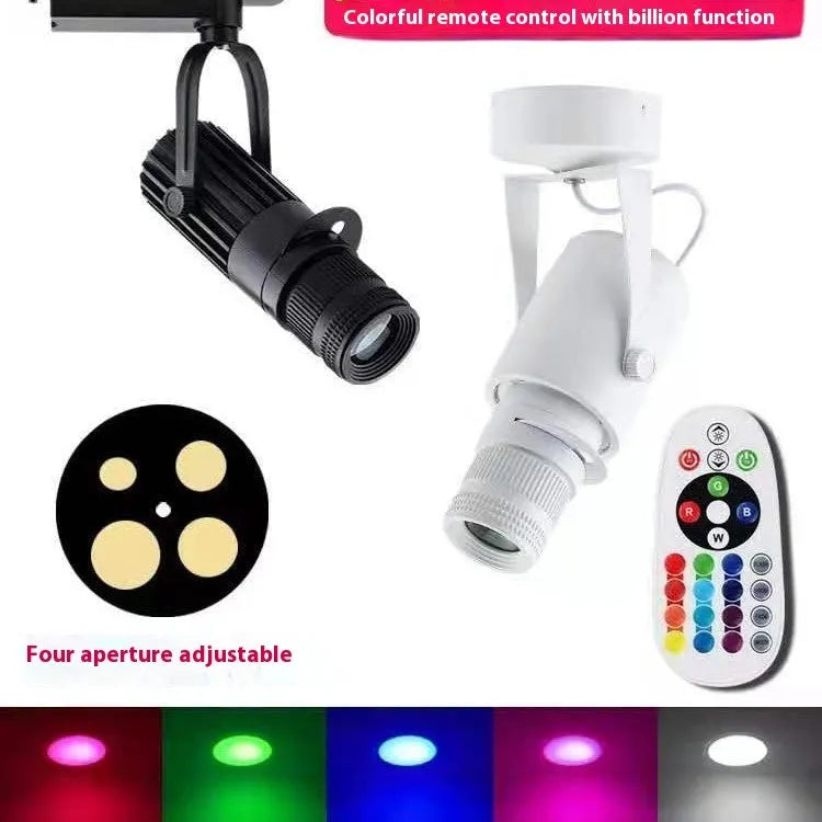 Black aluminium surface-mounted LED spotlight with open design for commercial lighting.