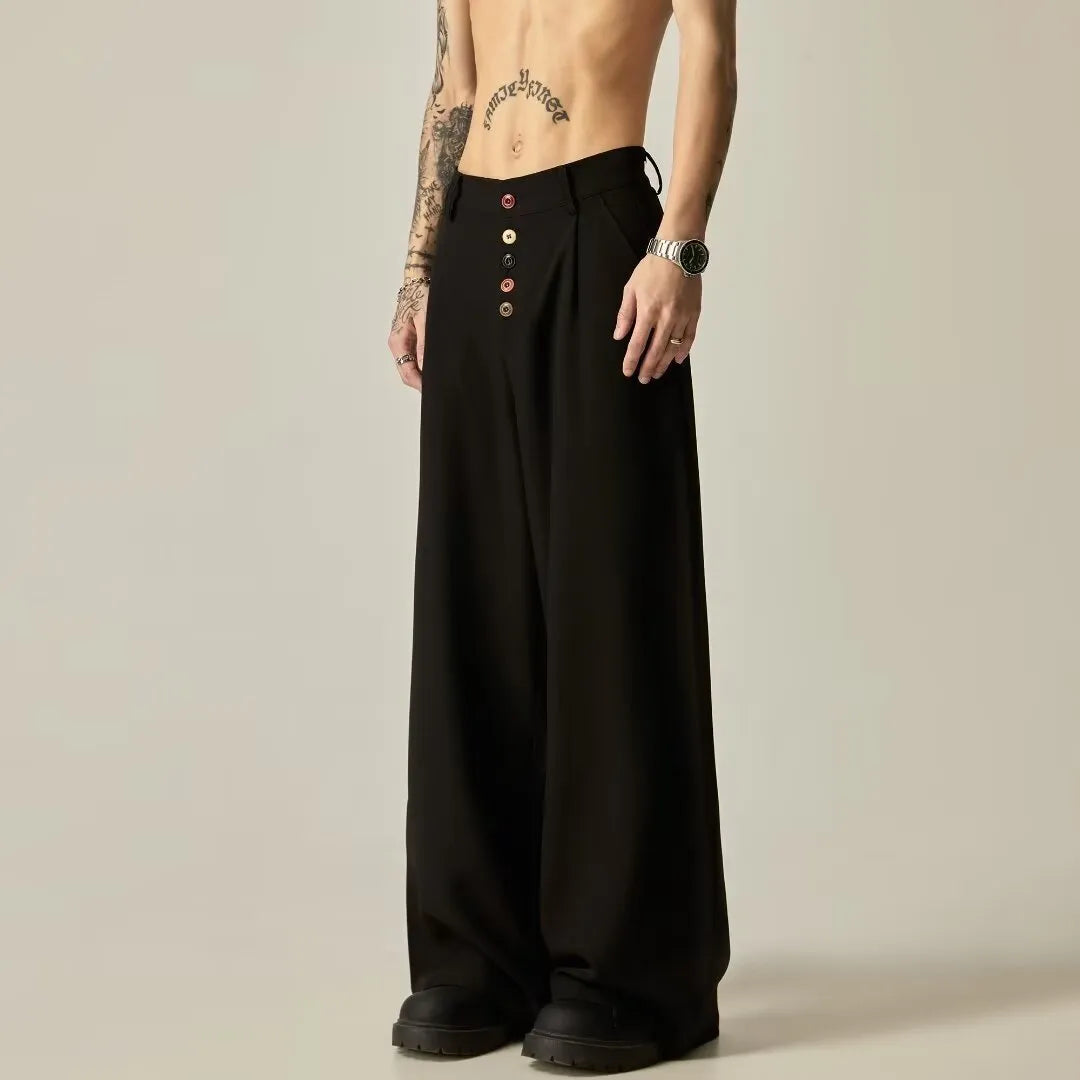 Men's solid colour wide-leg casual trousers in black, showing elastic waist and straight leg cut.