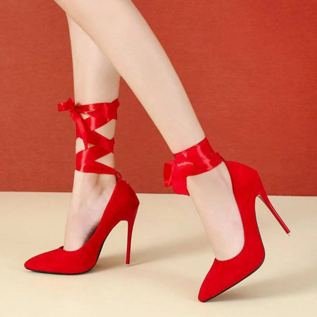 Black pointed toe high heel shoes with thin fabric straps and 12cm platform heel