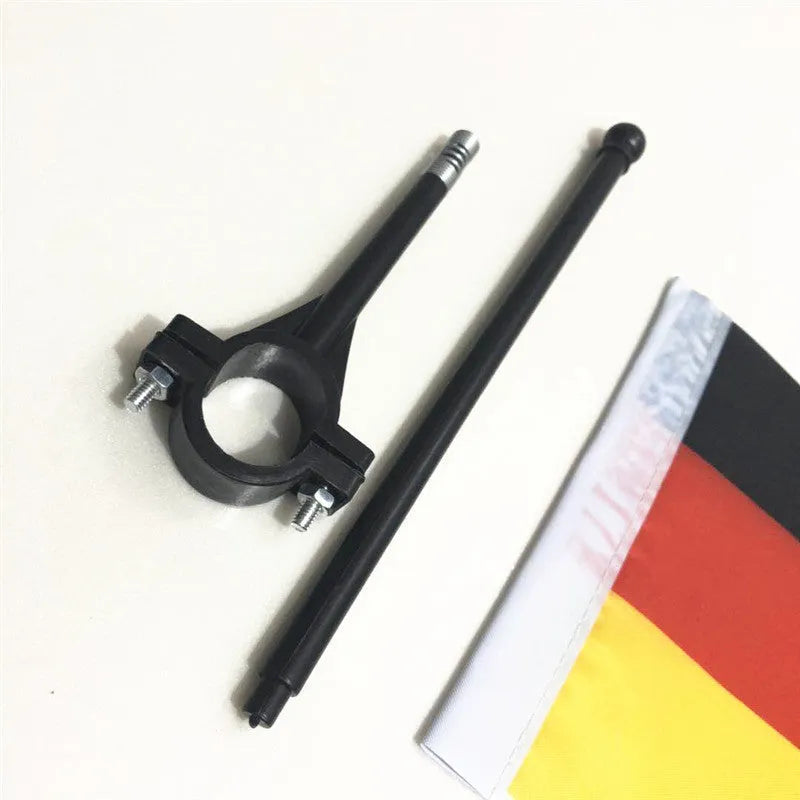 A square polyester flag on a plastic pole designed for bicycle handlebar mounting.
