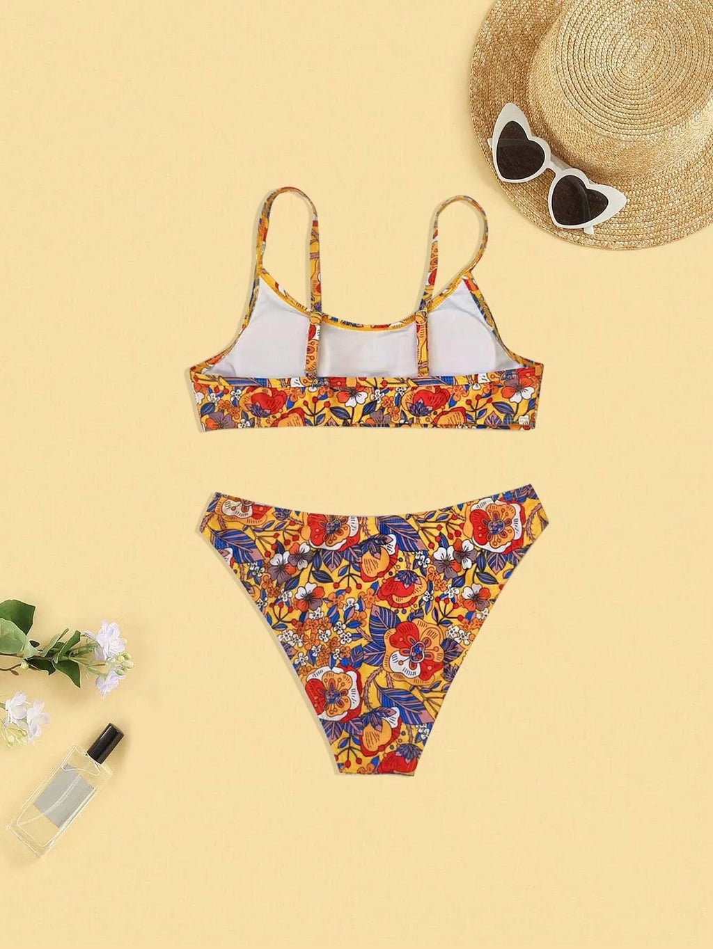 Plus size women's floral print bikini with adjustable straps, two-piece swimsuit set in colourful patterns