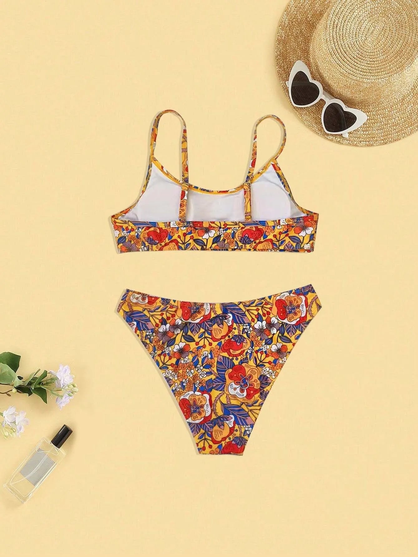 Plus size women's floral print bikini with adjustable straps, two-piece swimsuit set in colourful patterns