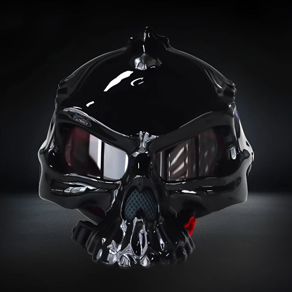 Reversible motorcycle helmet with skull artwork on both sides in black, grey, and red colour options